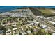 This aerial view showcases the neighborhood with road and nearby businesses at 4420 101St W St, Bradenton, FL 34210