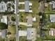 This aerial view displays the neighborhood homes and street at 4420 101St W St, Bradenton, FL 34210