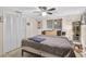 Cozy bedroom featuring neutral decor, large closet, and comfortable bed at 4420 101St W St, Bradenton, FL 34210