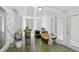Bright bonus room featuring durable tiled flooring and access to the exterior at 4420 101St W St, Bradenton, FL 34210
