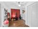 A versatile living room with hard floors, ceiling fan, and natural light at 4420 101St W St, Bradenton, FL 34210