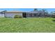 Spacious backyard featuring a screened-in pool, perfect for outdoor relaxation and entertaining at 4609 Talbot Pl, Sarasota, FL 34241