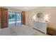 Bright bedroom with a view of the pool and patio, with a neutral color scheme at 4609 Talbot Pl, Sarasota, FL 34241