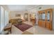 Bright living room with tile floors, complemented by a comfortable seating area and decorative accents at 4609 Talbot Pl, Sarasota, FL 34241