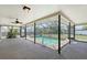 A refreshing in-ground pool with screened enclosure and outdoor space at 4609 Talbot Pl, Sarasota, FL 34241