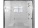 Clean and bright shower with glass door and tiled surround at 4610 Runabout Way, Bradenton, FL 34203