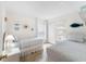 Comfortable bedroom featuring two beds, light colors, and closet at 4610 Runabout Way, Bradenton, FL 34203