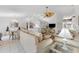 Open-concept living room with a seamless transition to the dining and kitchen areas at 4610 Runabout Way, Bradenton, FL 34203