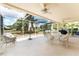 Outdoor screened porch offering a relaxing space to enjoy the peaceful water views at 4610 Runabout Way, Bradenton, FL 34203