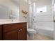 Well-maintained bathroom featuring modern fixtures and a tiled shower at 4814 Lake Breeze Ter, Sarasota, FL 34243