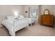 Bedroom featuring twin beds, neutral walls, and ample natural light at 4814 Lake Breeze Ter, Sarasota, FL 34243
