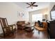 Comfortable living room with hardwood floors and natural light at 4814 Lake Breeze Ter, Sarasota, FL 34243