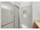 Bathroom featuring a glass-enclosed shower, framed print, and towel bar at 4838 San Ortebello Dr, Bradenton, FL 34208