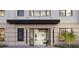 Stunning apartment building with a modern entrance and glass doors at 4950 Remington Dr # 114, Sarasota, FL 34234