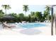 Gorgeous in-ground pool with sun loungers, palm trees and lush landscaping at 4950 Remington Dr # 114, Sarasota, FL 34234