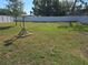 Spacious backyard featuring a custom-designed natural wood bird feeder at 5002 26Th Avenue Dr E, Palmetto, FL 34221