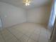 Bedroom features tile flooring, neutral paint and a ceiling fan at 5002 26Th Avenue Dr E, Palmetto, FL 34221