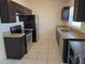 Well-lit kitchen featuring stainless steel appliances and granite countertops at 5002 26Th Avenue Dr E, Palmetto, FL 34221