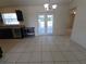 Kitchen overlooks breakfast nook with double doors to the outside patio at 5002 26Th Avenue Dr E, Palmetto, FL 34221
