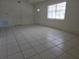Large living room with neutral paint and plenty of light at 5002 26Th Avenue Dr E, Palmetto, FL 34221