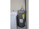 Utility room with washing machine, dryer, and water heater at 5002 26Th Avenue Dr E, Palmetto, FL 34221