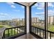 Take in expansive views from this private balcony overlooking the lake, beach, and community at 5780 Midnight Pass Rd # 410, Sarasota, FL 34242