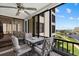 Enjoy outdoor dining on the private balcony with beautiful views of the beach at 5780 Midnight Pass Rd # 410, Sarasota, FL 34242
