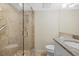 Well-maintained bathroom features a glass shower and granite vanity at 5780 Midnight Pass Rd # 410, Sarasota, FL 34242
