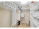 Walk-in closet with ample storage space and custom shelving at 5780 Midnight Pass Rd # 410, Sarasota, FL 34242