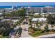 Manicured landscaping welcomes you to this condo community with beach access at 5780 Midnight Pass Rd # 410, Sarasota, FL 34242