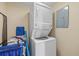 Efficient stacked washer and dryer unit, maximizing space in laundry area at 5780 Midnight Pass Rd # 410, Sarasota, FL 34242