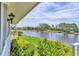 Picturesque backyard with lake views, offering serenity and a close connection with nature at 623 Estuary Dr, Bradenton, FL 34209