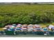 Overhead shot of colorful community kayaks neatly stored, ready for waterfront adventures at 623 Estuary Dr, Bradenton, FL 34209