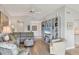 Spacious living room with hardwood floors, comfortable seating, and a built-in entertainment center at 623 Estuary Dr, Bradenton, FL 34209