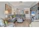 Comfortable living room with hardwood floors, modern decor, and lots of seating at 623 Estuary Dr, Bradenton, FL 34209