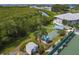 Aerial view of a shuffleboard court near the water in a beautifully landscaped community at 623 Estuary Dr, Bradenton, FL 34209