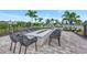 Cozy outdoor fire pit area with comfortable seating for gathering and enjoying the evening at 6252 Winding Pine Dr, Nokomis, FL 34275