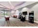 Fun game room featuring classic arcade games and a shuffleboard table for leisure and entertainment at 6252 Winding Pine Dr, Nokomis, FL 34275