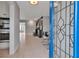 View of the home's bright entryway featuring tile floors and an open floor plan at 6422 Beechwood Ave, Sarasota, FL 34231