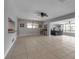 Open-concept living room featuring tile flooring and ample space for entertaining at 6422 Beechwood Ave, Sarasota, FL 34231