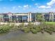 Waterfront condos with stunning bay views, manicured lawns, and private beach access at 6460 Mourning Dove Dr # 102, Bradenton, FL 34210