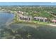 Waterfront condos feature breathtaking views, lush landscaping, and access to the bay at 6460 Mourning Dove Dr # 102, Bradenton, FL 34210