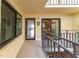 Balcony with views, railing, and access to the inside of the home at 6460 Mourning Dove Dr # 102, Bradenton, FL 34210