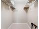 Walk-in closet with wire shelving, providing ample storage space at 6460 Mourning Dove Dr # 102, Bradenton, FL 34210