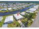 Aerial view of homes along canals in a waterfront community near Tampa Bay at 649 Fairmount Dr, North Port, FL 34287