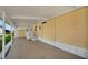 Covered patio with ample space perfect for entertaining, access to storage and the main house at 649 Fairmount Dr, North Port, FL 34287