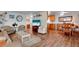 Open-concept living space featuring cozy seating, and stylish furnishings at 649 Fairmount Dr, North Port, FL 34287