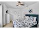 Light and airy bedroom featuring coastal-themed decor and a comfortable bed with nautical patterned bedding at 6924 34Th W Ave, Bradenton, FL 34209