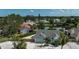 Beautiful home with a well-kept lawn and fence, with a peek of the lake in the background at 6924 34Th W Ave, Bradenton, FL 34209