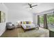 Spacious main bedroom with natural light, ceiling fan, and neutral accents at 6924 34Th W Ave, Bradenton, FL 34209